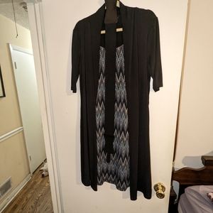 Connected brand dress. Size large with a belt. Black shell/ multicolor inside